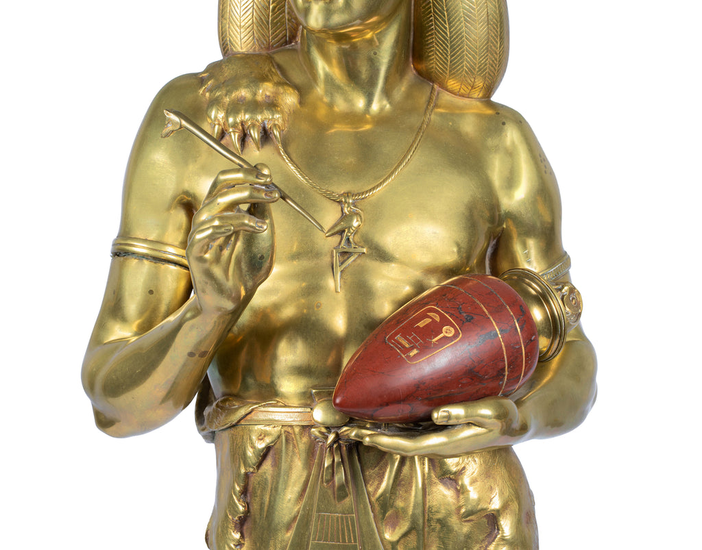 A FRENCH ANTIQUE GILT BRONZE FIGURE OF AN EGYPTIAN SCRIBE BY EMILE PICAULT