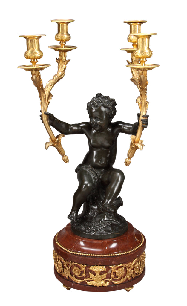 A LARGE FRENCH PATINATED BRONZE FIGURAL CLOCK GARNITURE AFTER JEAN ANTOINE HOUDON