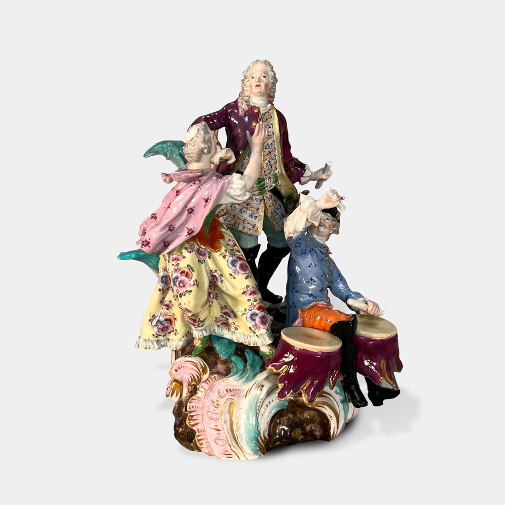 A MEISSEN PORCELAIN FIGURAL GROUP DRUMMER AND DANCERS, 19TH CENTURY