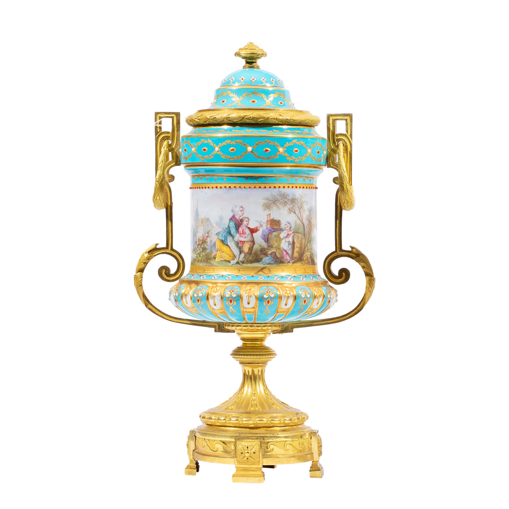 A FINE PAIR OF FRENCH ORMOLU MOUNTED SEVRES STYLE PORCELAIN JEWELED VASES
