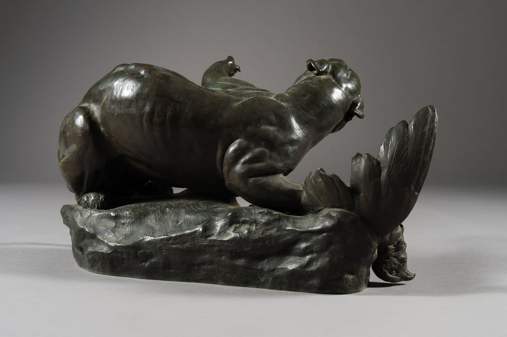 A FRENCH PATINATED BRONZE MODEL OF A LIONESS BY LEON BUREAU