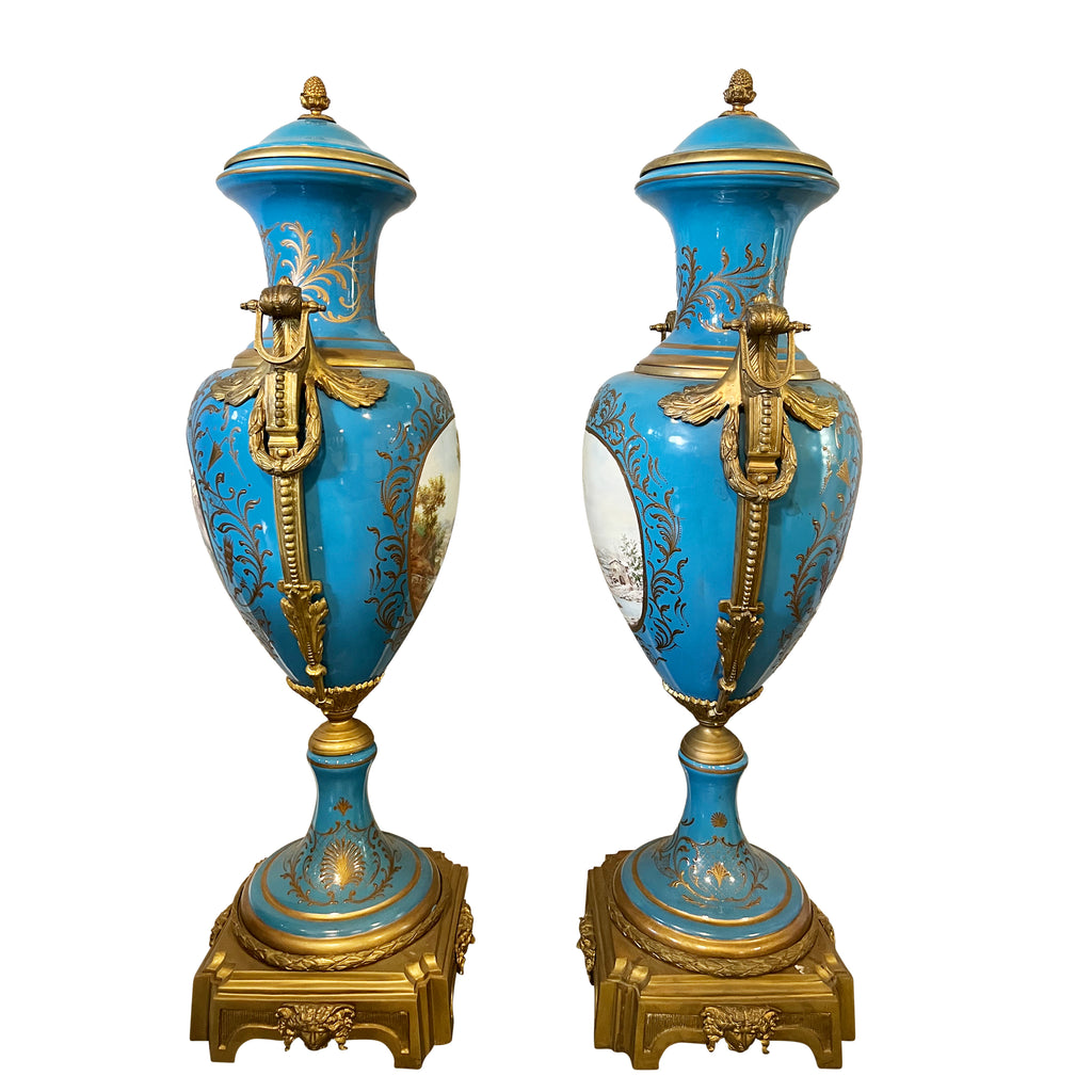 PAIR OF SEVRES STYLE ORMOLU MOUNTED PORCELAIN LIDDED VASES, 20TH CENTURY