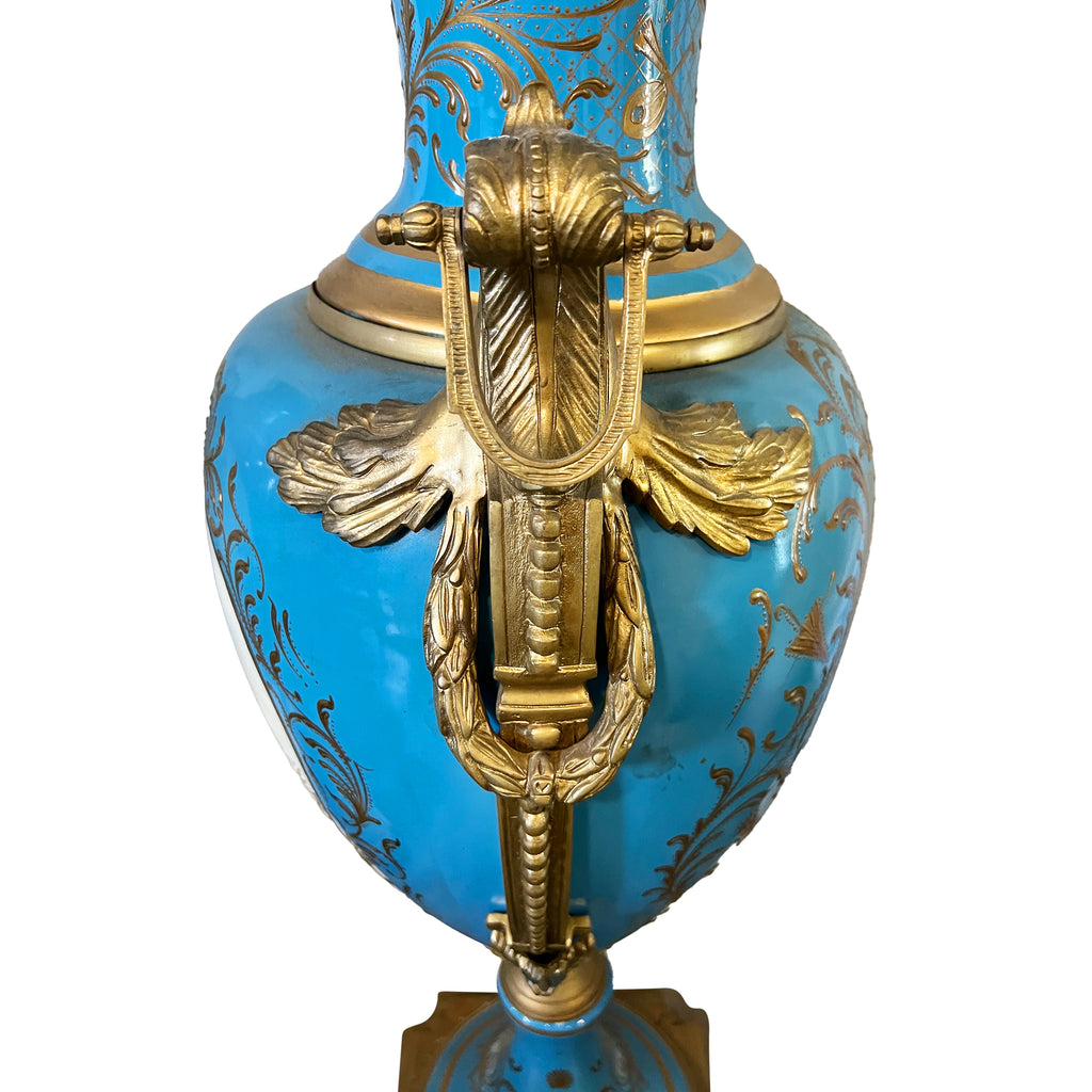 PAIR OF SEVRES STYLE ORMOLU MOUNTED PORCELAIN LIDDED VASES, 20TH CENTURY