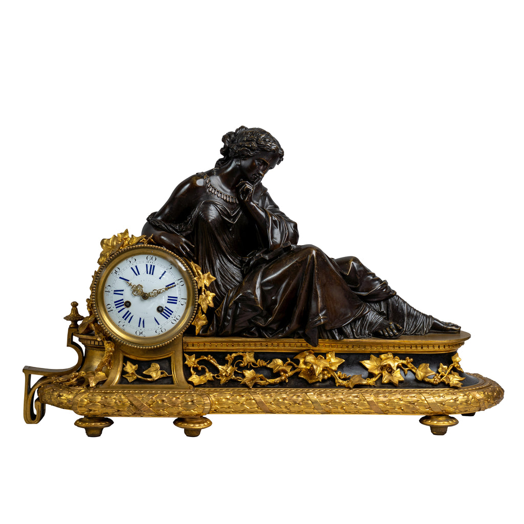 FRENCH ORMOLU AND PATINATED BRONZE MANTEL CLOCK DEPICTING 'CLEOPATRA', 19TH CENTURY