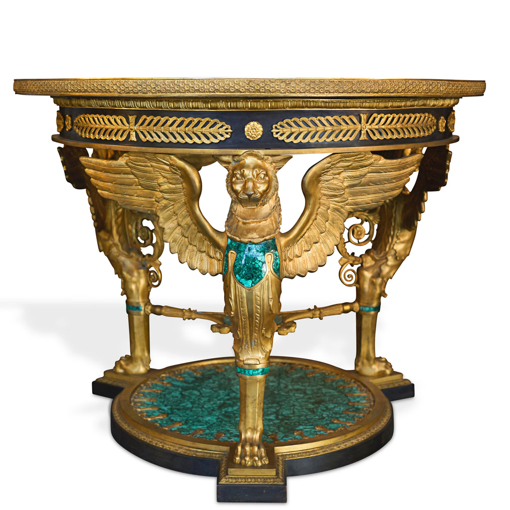 A FRENCH EMPIRE STYLE GILT BRONZE AND MALACHITE CENTER TABLE