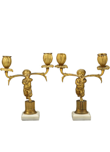A Pair of French Bronze & White Marble Figural Candle Holders