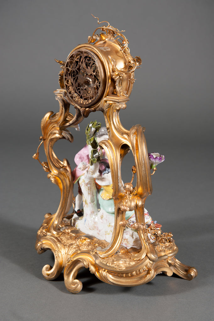 A 19th Century French Louis XV Style Gilt Bronze & porcelain Clock