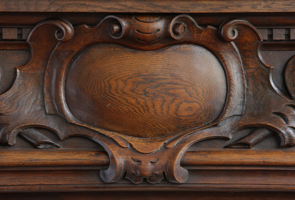 Monumental French Carved walnut and Oak fireplace