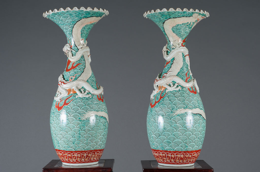 A Pair of Japanese Kutani Porcelain Vases with Koi and Dragon Motifs