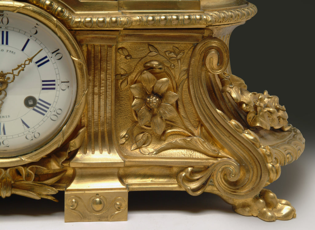 A 19th Century French Gilt & Patinated Bronze Figural Mantel Clock by Raingo