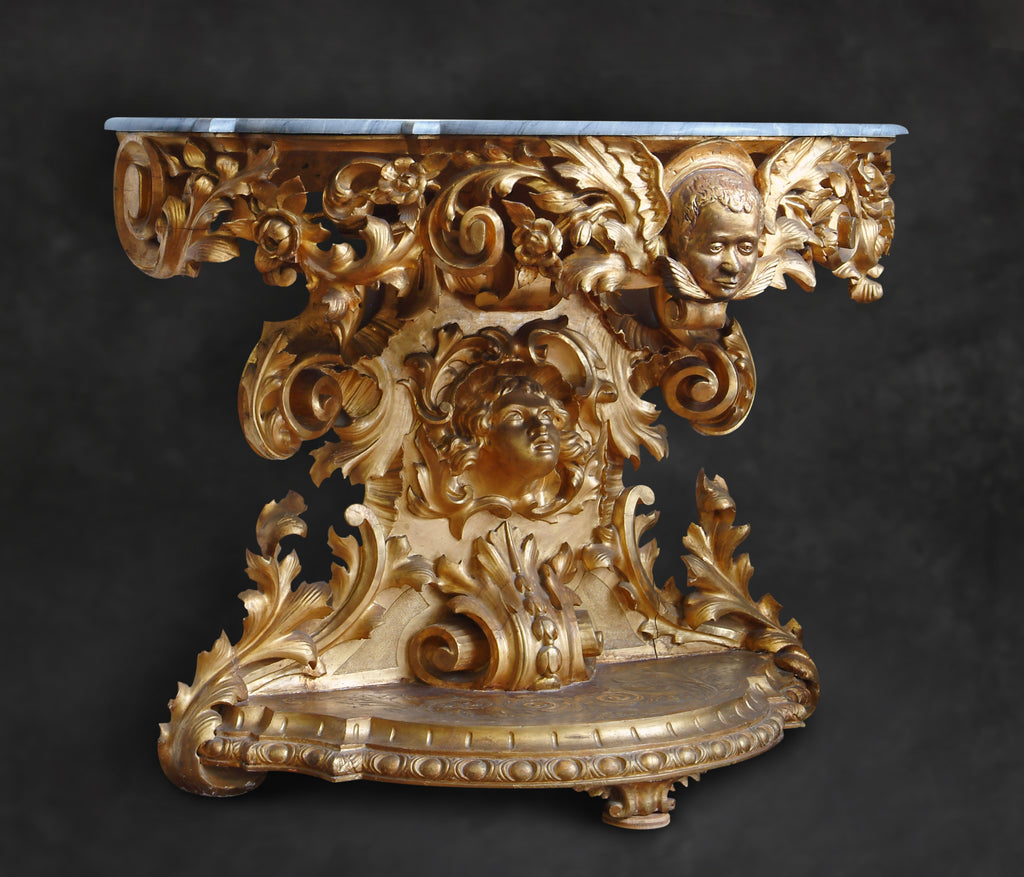 Monumental Italian carved giltwood console and mirror