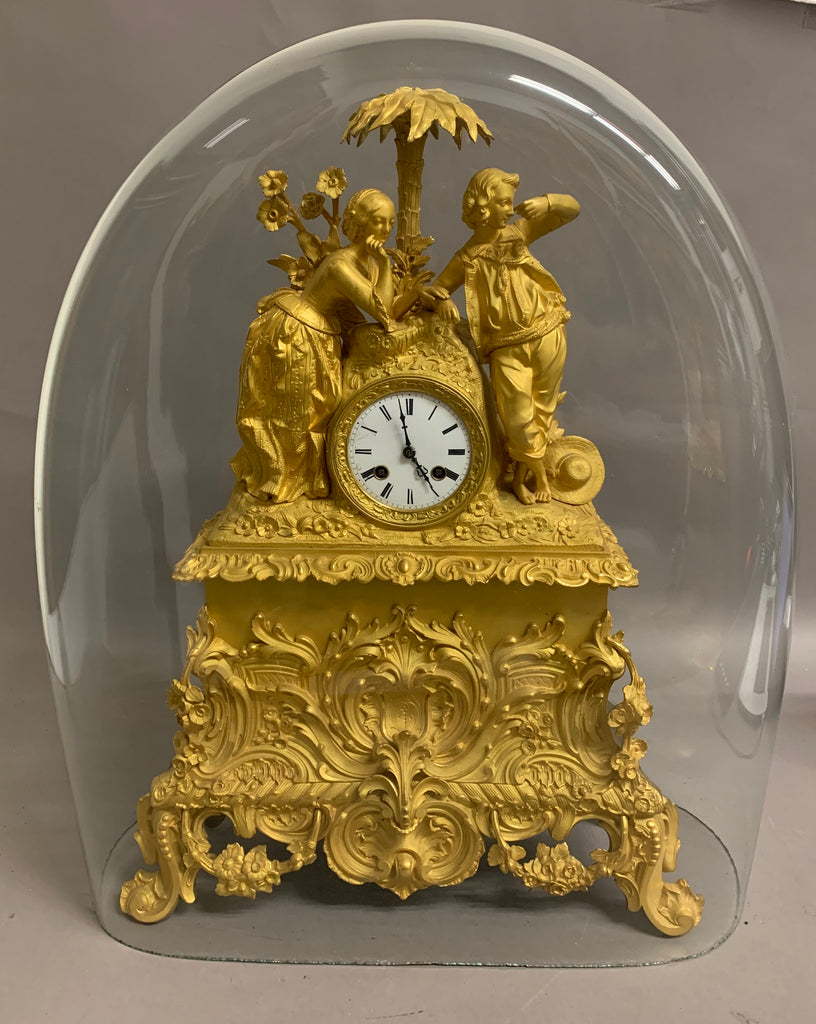 French ormolu figural mantel clock with glass dome circa 1820
