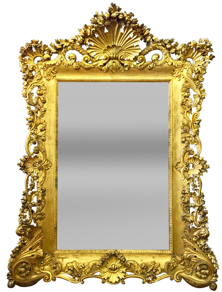 A Momumental Antique French Louis XV Style Carved Giltwood Mirror