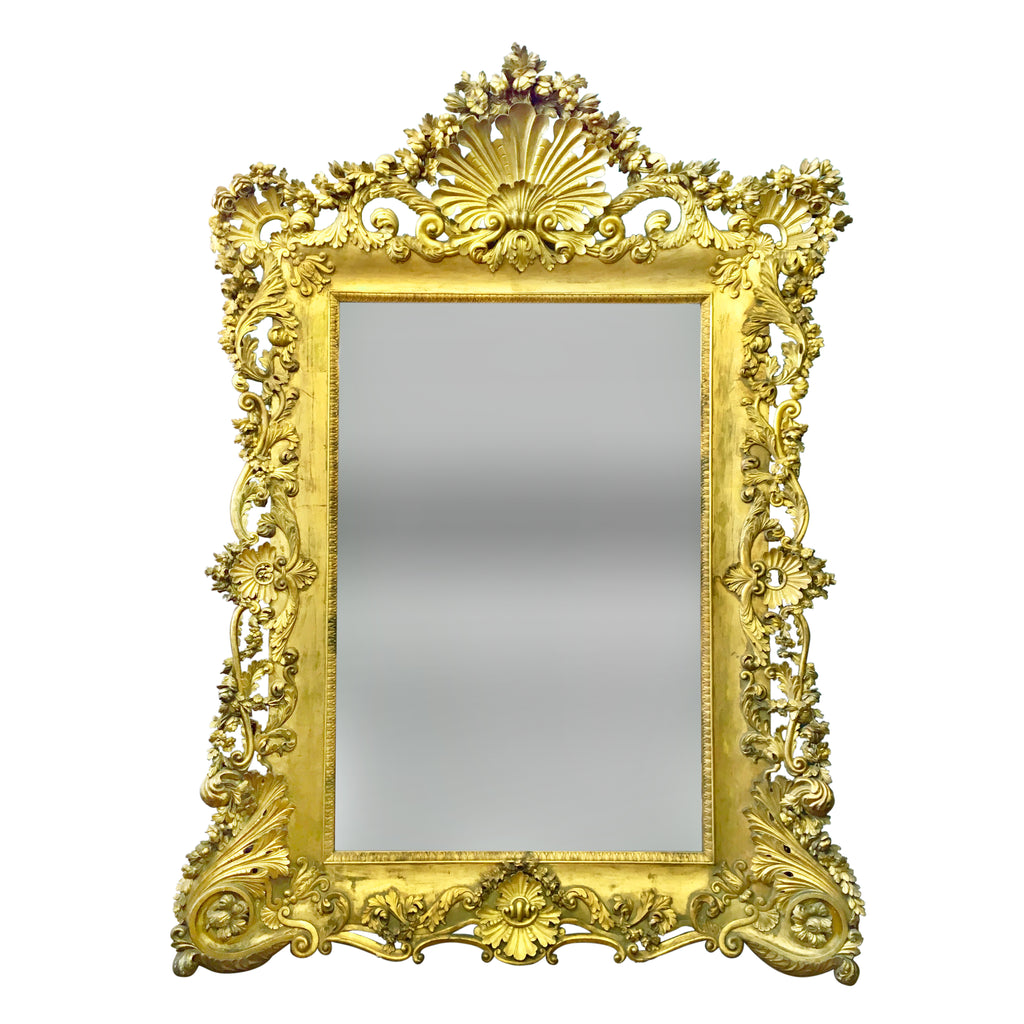A Momumental Antique French Louis XV Style Carved Giltwood Mirror