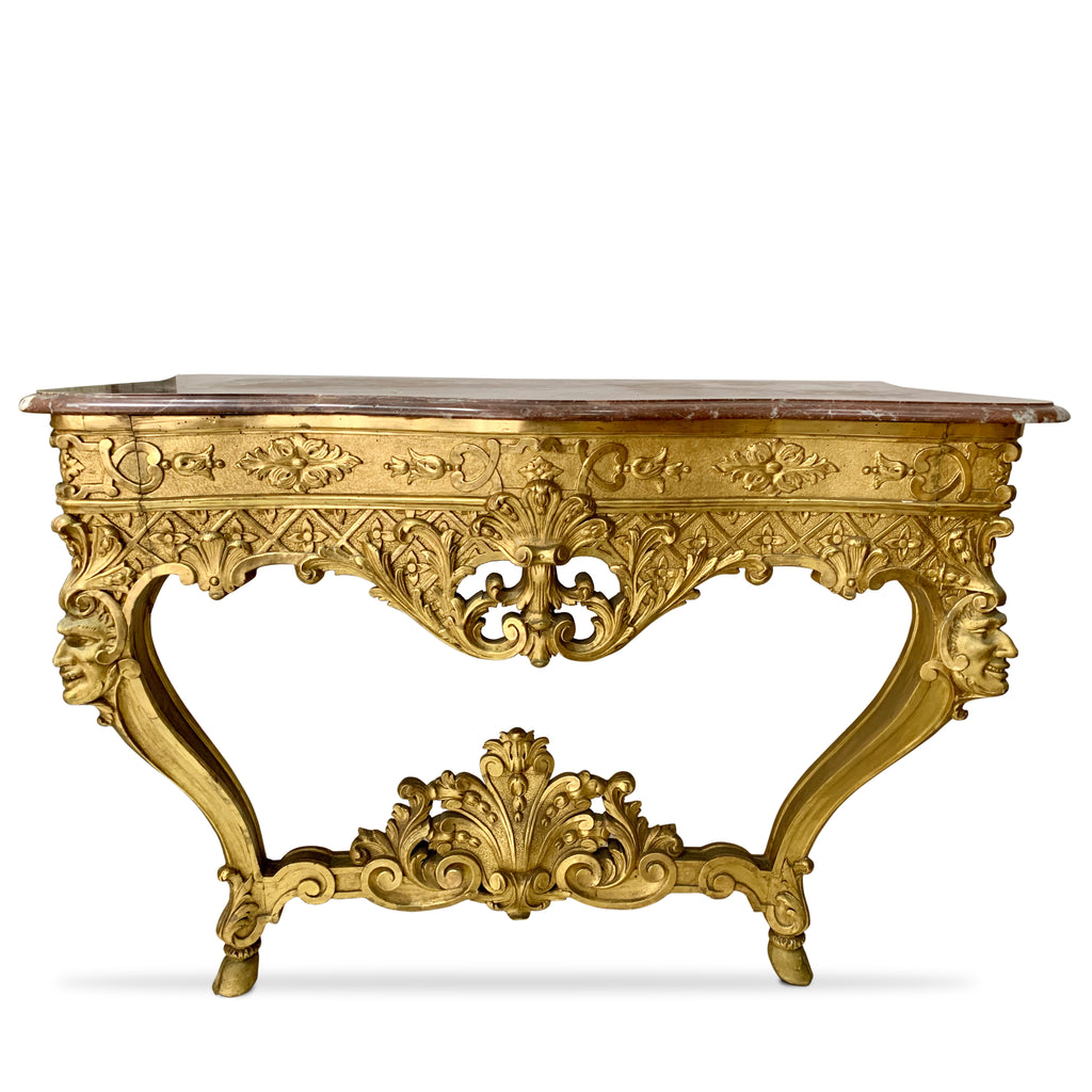 19th c. French giltwood console table with smiling male masks