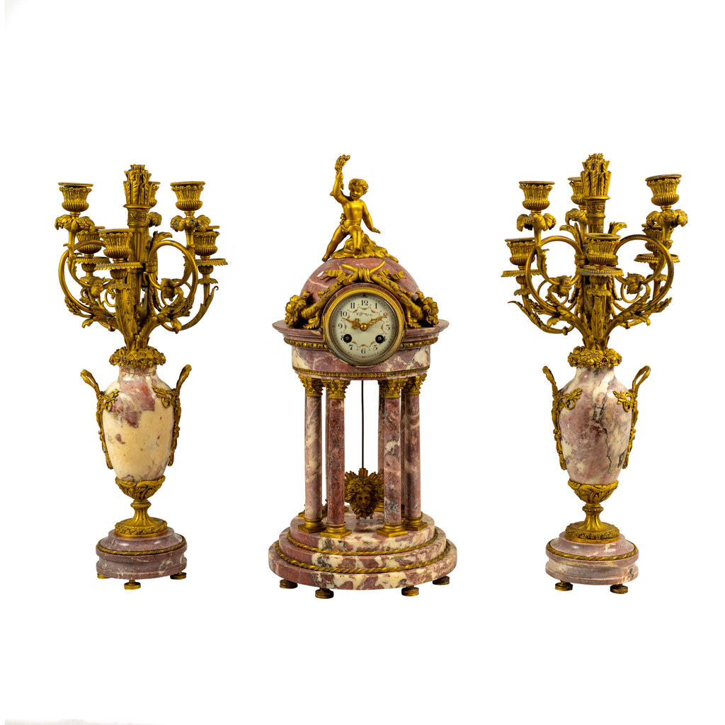 A FRENCH BRECHE VIOLETTE MARBLE & ORMOLU BRONZE CLOCK GARNITURE RETAILED BY TIFFANY & CO