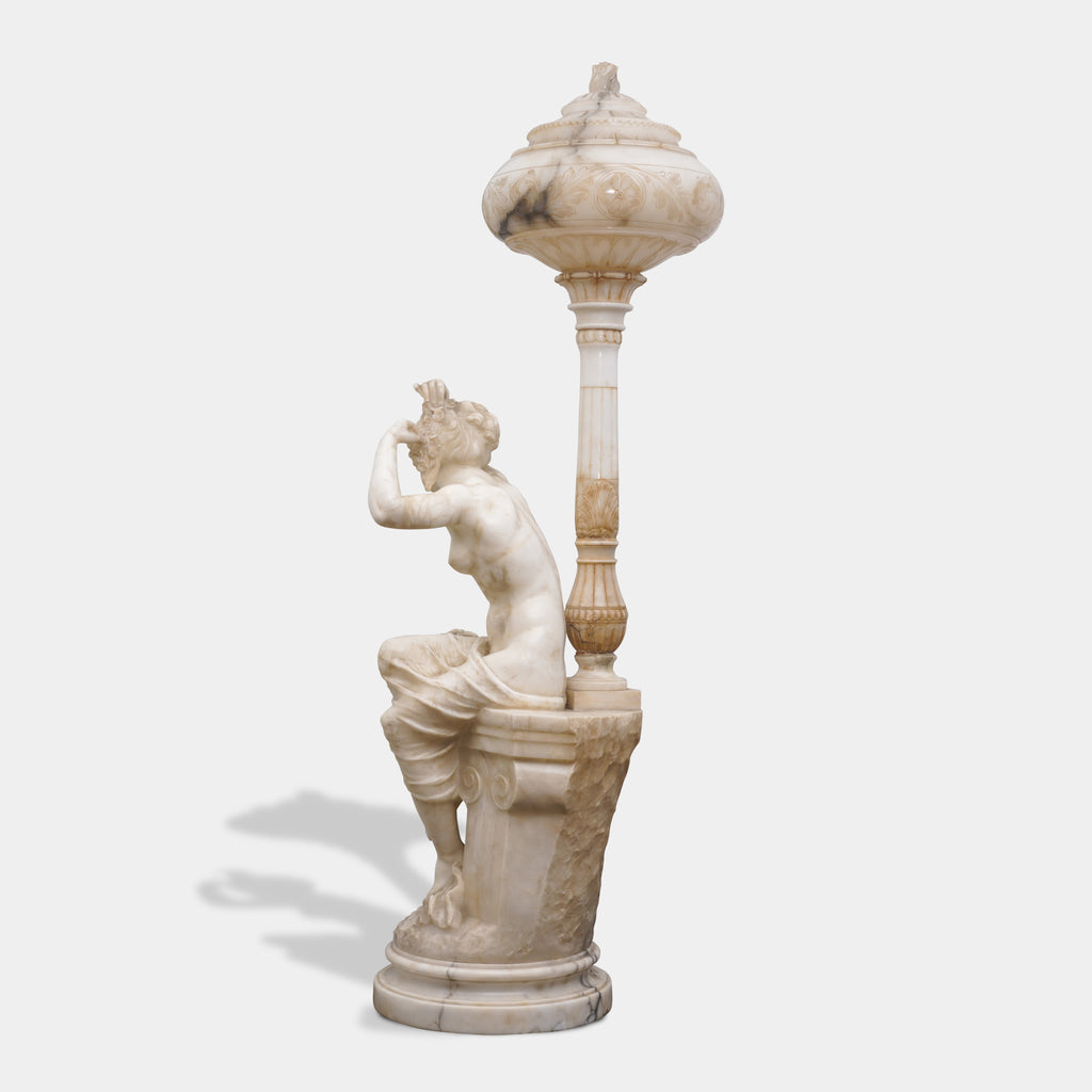 Pair of large antique Italian carved alabaster figural lamps depicting Venus & Cupid