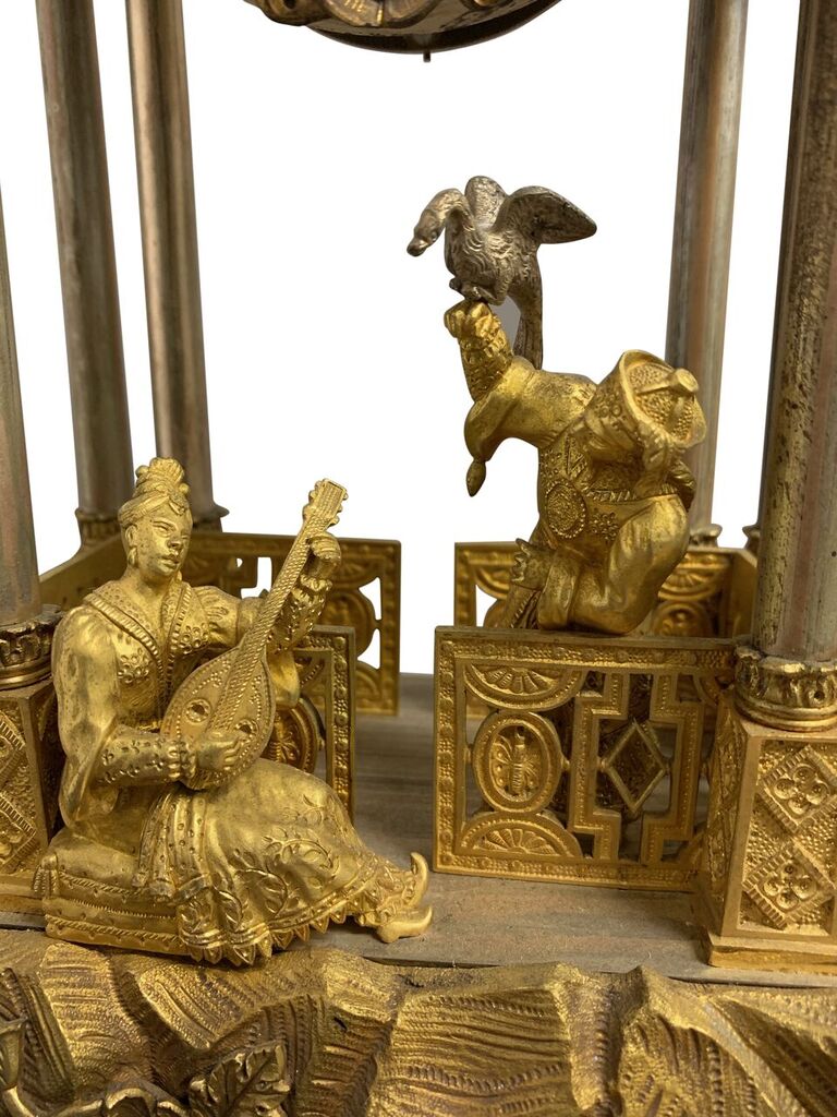 A Very Fine French Silvered and Gilt Bronze 3-Piece Chinoiserie Clock Garniture