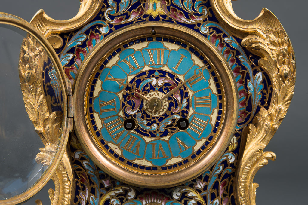 A FRENCH GILT BRONZE & CHAMPLEVE 8-DAY MANTEL CLOCK BY JAPY FRERES