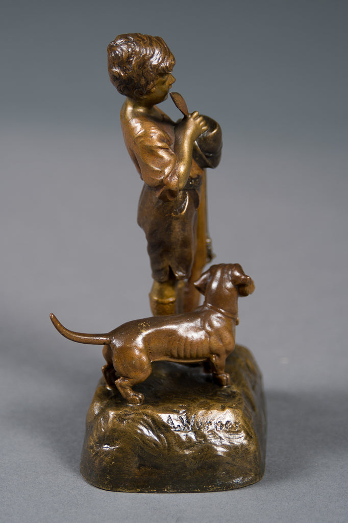 An Antique Austrian Bronze Figure of a Boy with His Dog and a Rifle