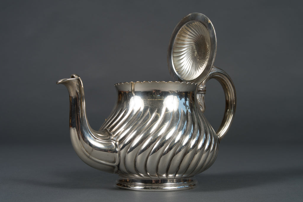 An Antique 4-Piece Silver Plated Tea Set by Christofle