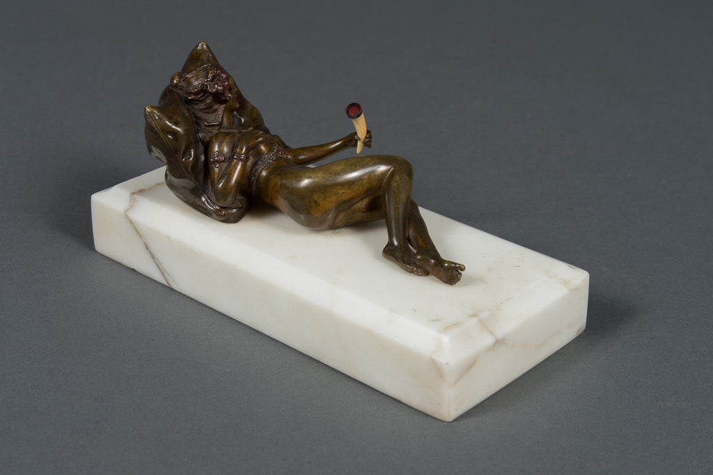 AN AUSTRIAN PATINATED BRONZE OF 'CLEOPATRA' BY ALFONSO TITZE