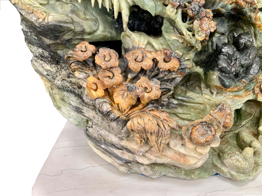 Monumental Chinese carved serpentine jade mountain sculpture